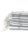 Grey striped organic cotton peshtemal hand towel with fringe, soft, sustainable, and Turkish artisan-made