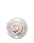 Ferhan Subtle Shimmer by Sans Skincare – creamy, whipped face balm inside open jar with luminous, soft pink shimmer texture