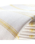 Golden striped organic cotton peshtemal hand towel with fringe, lightweight, soft, and sustainable