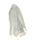 Artisan-made sandstone organic cotton peshtemal hand towel, soft, sustainable, and ideal for spa and skincare rituals