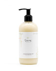 Sans Skincare Moisturizing Body Wash in tall cream-colored bottle with black pump dispenser, labeled super moisturizing