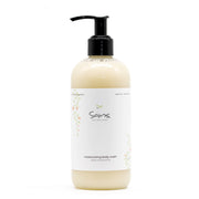 Sans Skincare Moisturizing Body Wash in tall cream-colored bottle with black pump dispenser, labeled super moisturizing