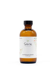 Sans Skincare Nourishing Oil Cleanser in amber bottle, gentle natural formula that removes makeup and impurities for all skin types