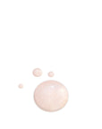 Sans Skincare Silky Shimmer Body Oil – radiant drops outside the bottle showing luminous, glowing shimmer on skin