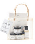 Sans Skincare Starter Set – travel-size natural skincare kit with foaming cleanser, rhassoul clay mask, face butter, scrub, and serum