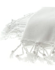 Bright white organic cotton Turkish peshtemal hand towel with fringe – artisan-made, eco-friendly, soft spa towel