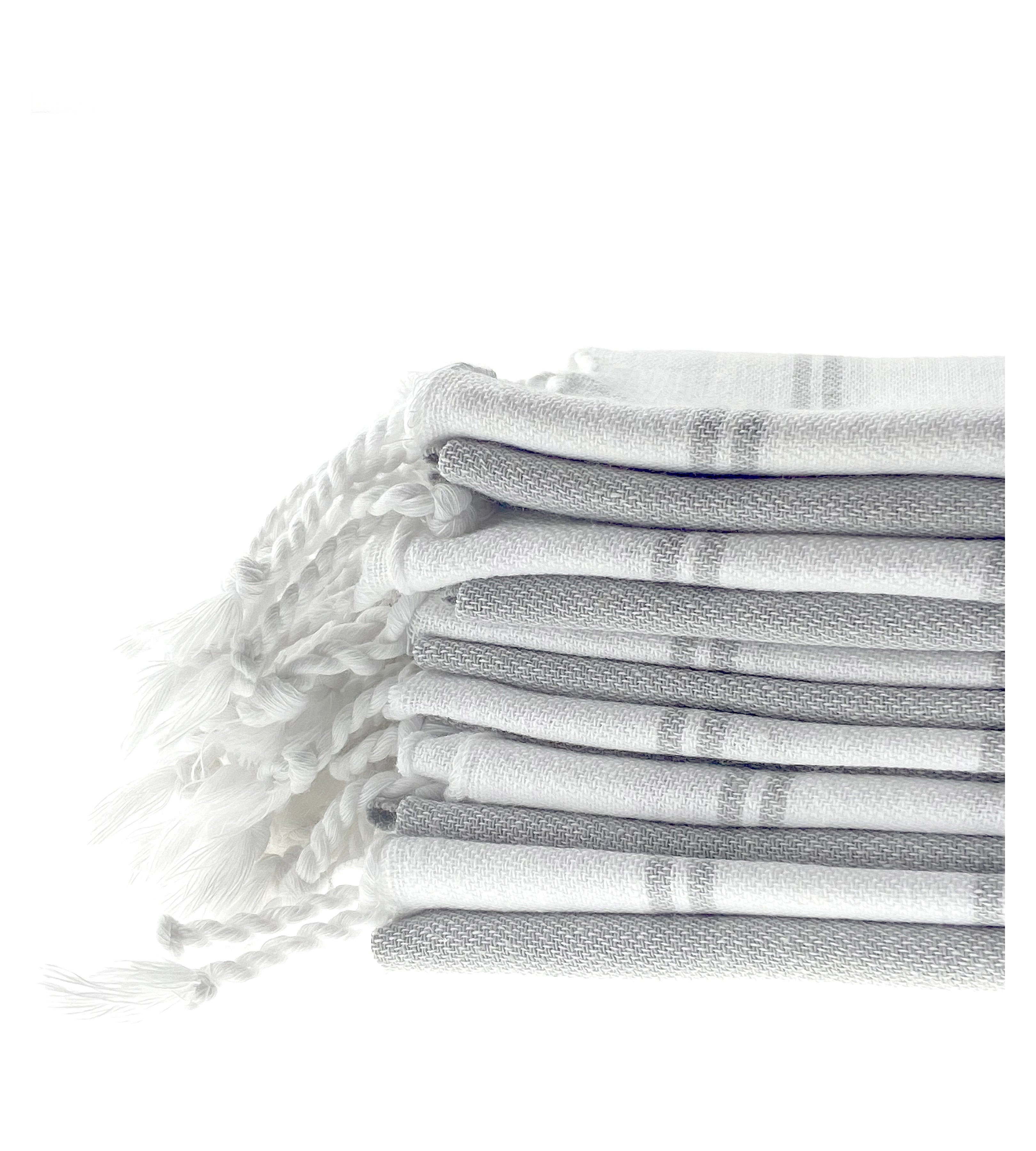 Grey striped organic cotton peshtemal hand towel with fringe, soft, sustainable, and Turkish artisan-made