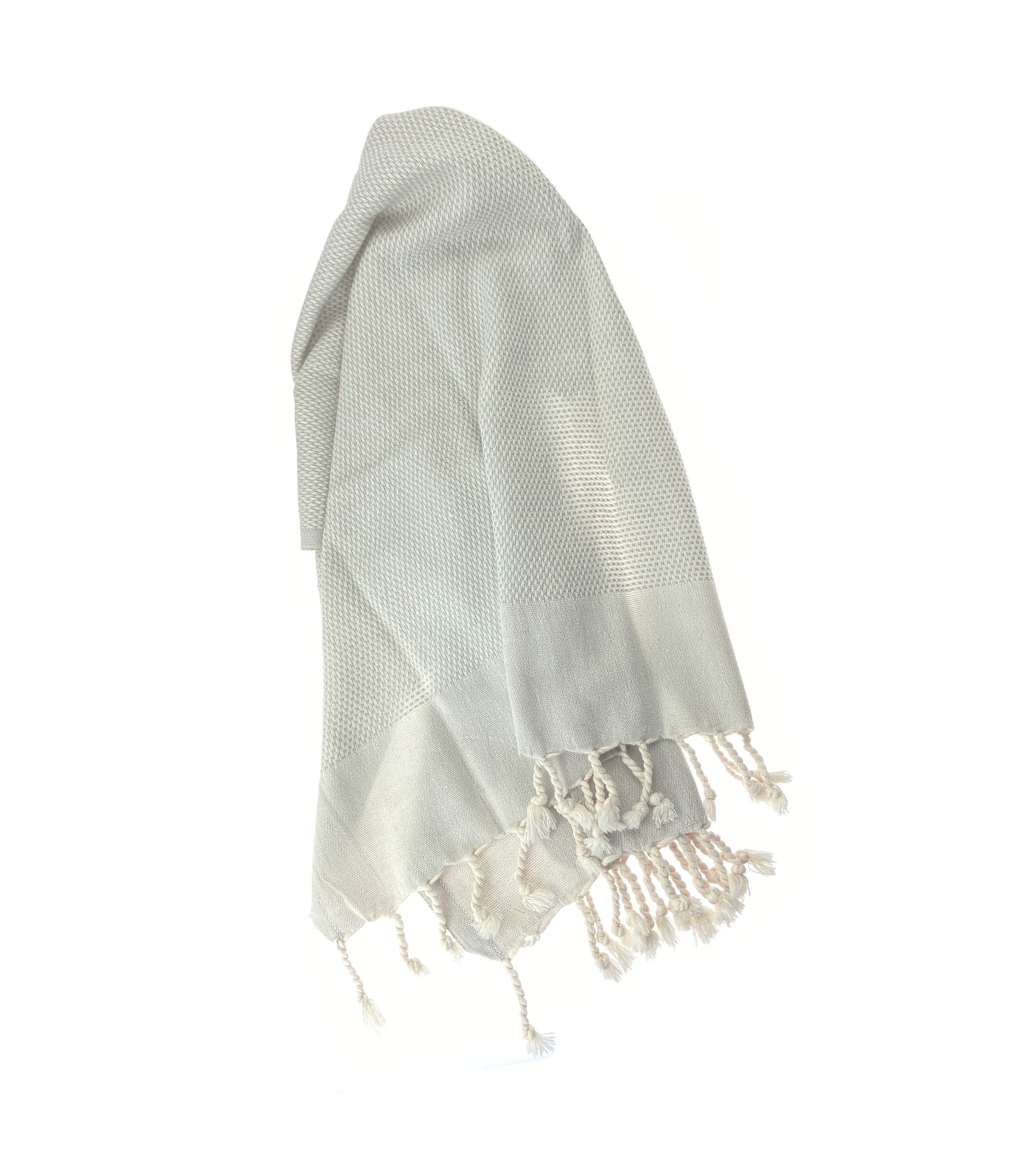 Artisan-made sandstone organic cotton peshtemal hand towel, soft, sustainable, and ideal for spa and skincare rituals