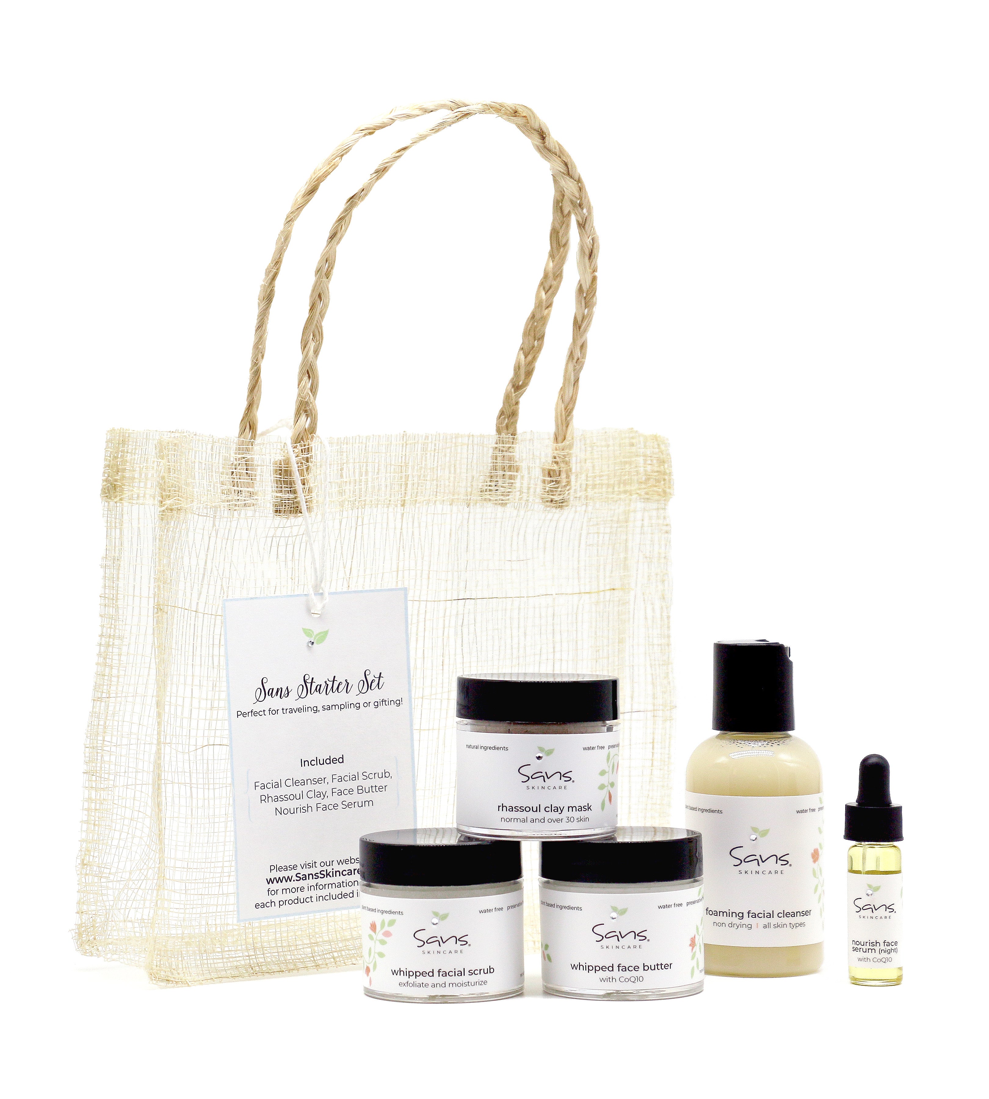 Starter Set by Sans Skincare – mini plant-based skincare essentials in a woven travel bag, includes cleanser, mask, scrub, serum, and butter
