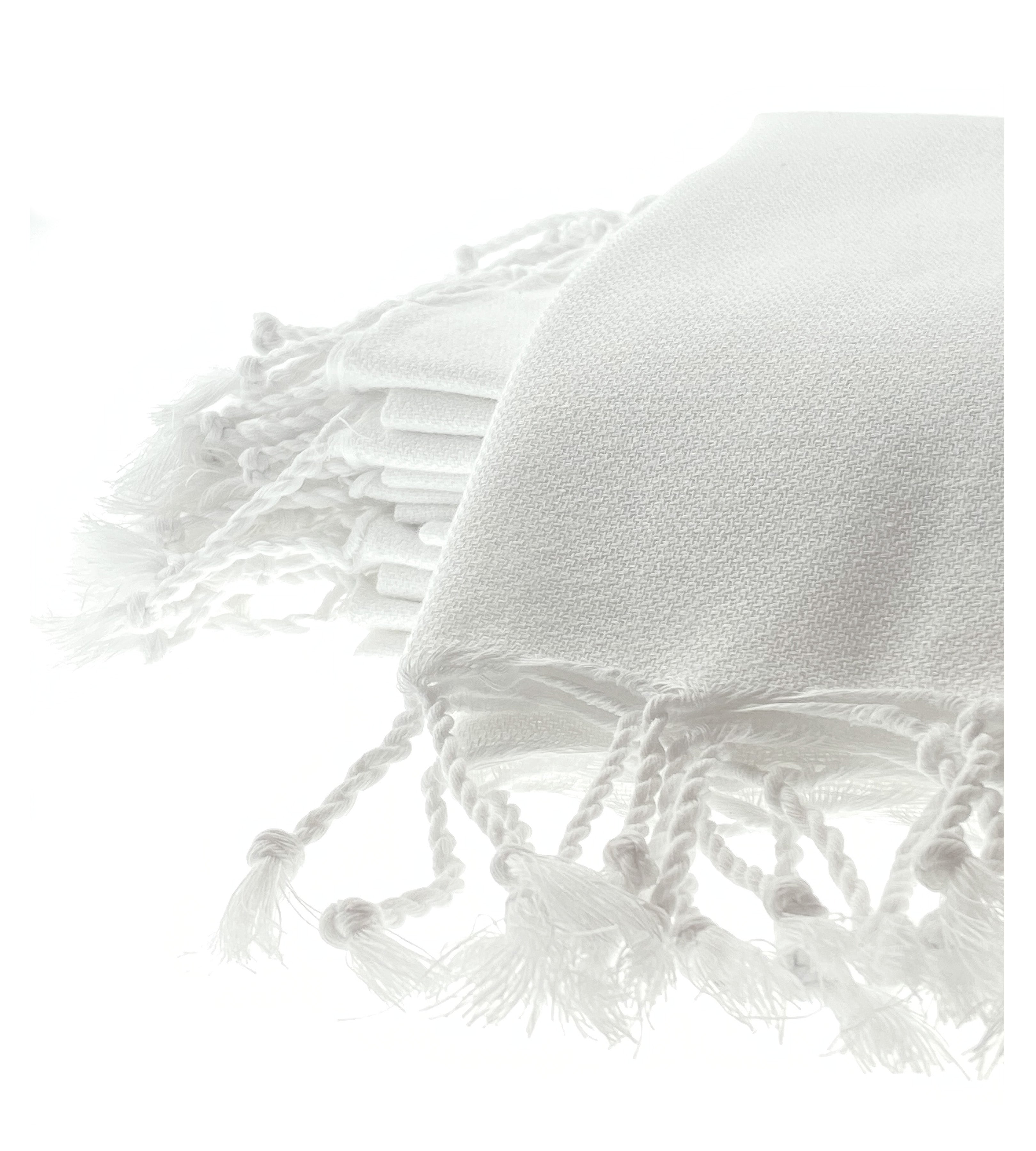 Bright white organic cotton Turkish peshtemal hand towel with fringe – artisan-made, eco-friendly, soft spa towel